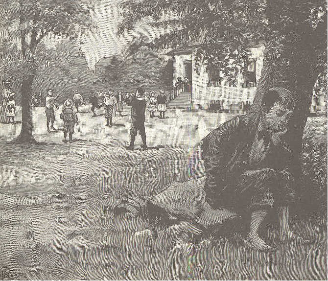 Boy sitting alone under tree in schoolyard. Other children playing in background.