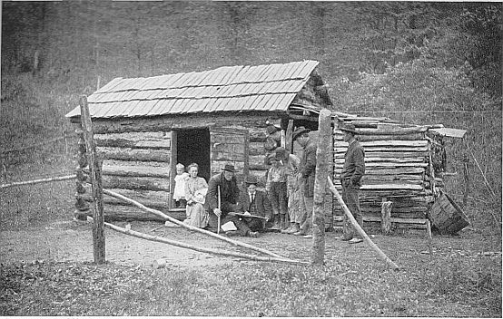 TAKING THE CENSUS IN OLD KENTUCKY: Typical conditions of
an enumerator's work in the mountain districts. (Courtesy of Art
Manufacturing Co., Amelia, O.)