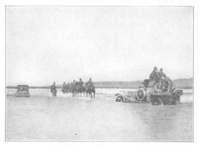 Towing an armored car across a river