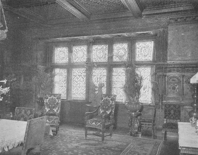 DINING-ROOM IN NEW YORK HOUSE SHOWING LEADED-GLASS
WINDOWS