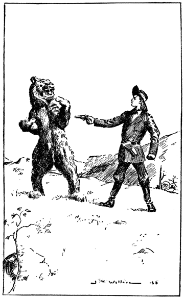 A man aims a gun at a bear.