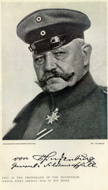 This is the photograph of von Hindenburg which very
German has in his home