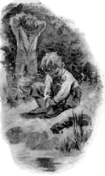 Boy seated on the ground