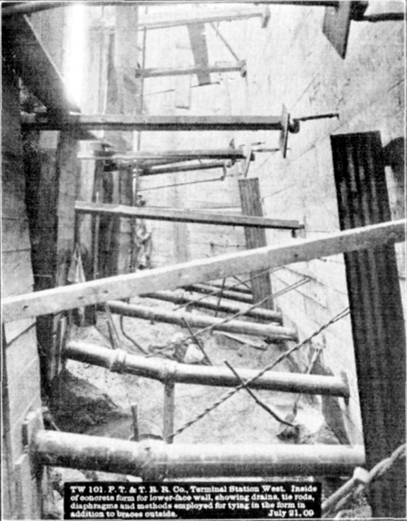 Plate LII, Fig. 4.— TW 101. P.T. & T.R.R. Co. Terminal Station West. Inside of concrete form for lower-face wall, showing drains, tie rods, diaphragms and methods employed for tying in the form in addition to braces outside. July 21, 09.