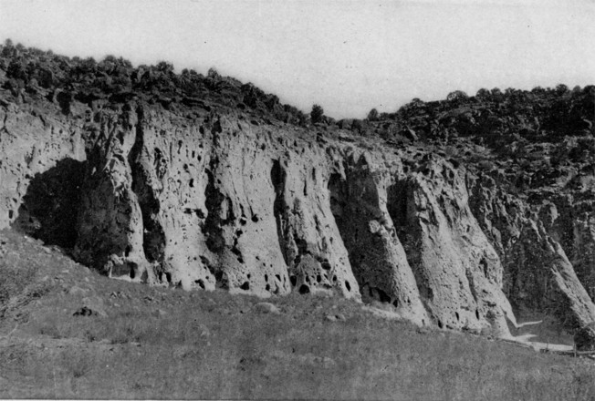 A westerly cliff of the habitations of the Tyuonyi, showing second and third story caves, and some high lookout caves