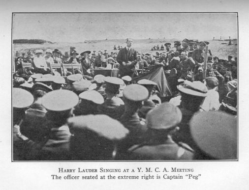 Harry Lauder Singing at a Y. M. C. A. Meeting.  The Officer seated at the extreme right is Captain "Peg."