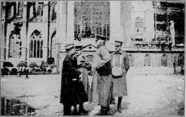 Reading from left to right: a Belgian Staff Officer, Colonel Fairholme, Colonel DuCane and Captain Ferguson. (Malines Cathedral in the background)
