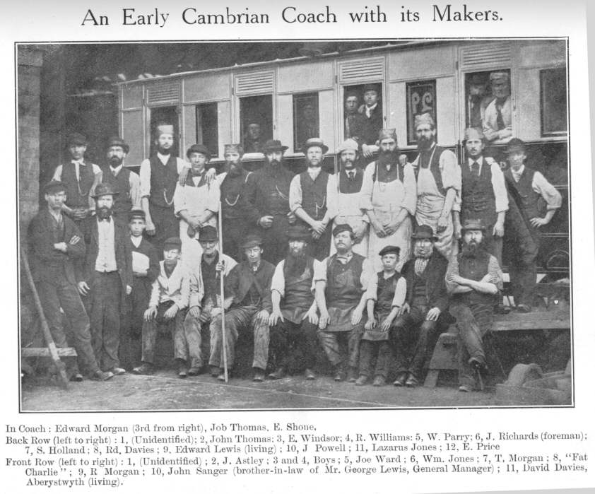 An Early Cambrian Coach with its Makers.  In Coach: Edward Morgan
(3rd from right), Job Thomas, E. Shone.  Back Row (left to right): 1,
(Unidentified); 2, John Thomas; 3, E. Windsor; 4, R. Williams: 5, W. Parry;
6, J. Richards (foreman); 7, S. Holland; 8, Rd. Davies; 9, Edward Lewis
(living); 10, J. Powell; 11, Lazarus Jones; 12, E. Price.  Front Row (left
to right): 1 (Unidentified); 2, J. Astley; 3 and 4, Boys; 5, Joe Ward; 6,
Wm. Jones; 7, T. Morgan; 8, “Fat Charlie”; 9, R. Morgan; 10,
John Sanger (brother-in-law of Mr. George Lewis, General Manager); 11,
David Davies, Aberystwyth (living)
