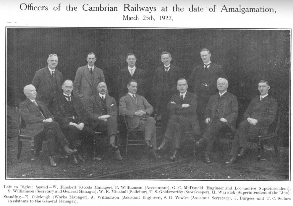 Officers of the Cambrian Railways at the date of Amalgamation,
March 25th, 1922.  Left to Right: Seated—W. Finchett (Goods Manager),
R. Williamson (Accountant), G. C. McDonald (Engineer and Locomotive
Superintendent), S. Williamson (Secretary and General Manager), W. K.
Minshall (Solicitor), T. S. Goldsworthy (Storekeeper), H. Warwick
(Superintendent of the Line).  Standing—E. Colclough (Works Manager),
J. Williamson (Assistant Engineer), S. G. Vowles (Assistant Secretary), J.
Burgess and T. C. Sellars (Assistants to the General Manager)