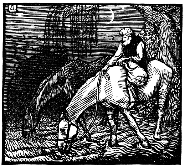 A man sits on a grazing horse.