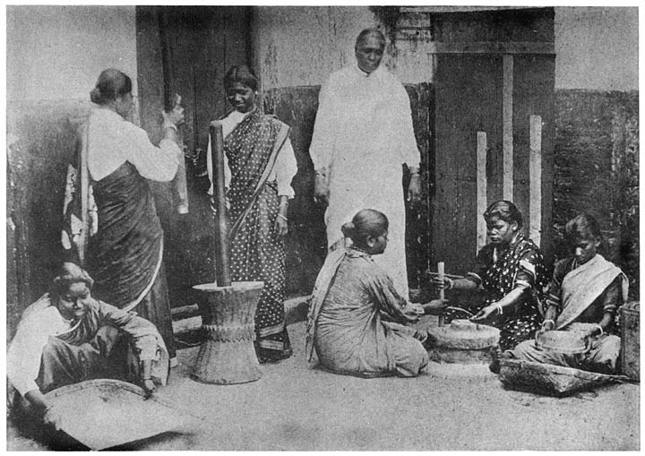 Women grinding wheat and husking rice
