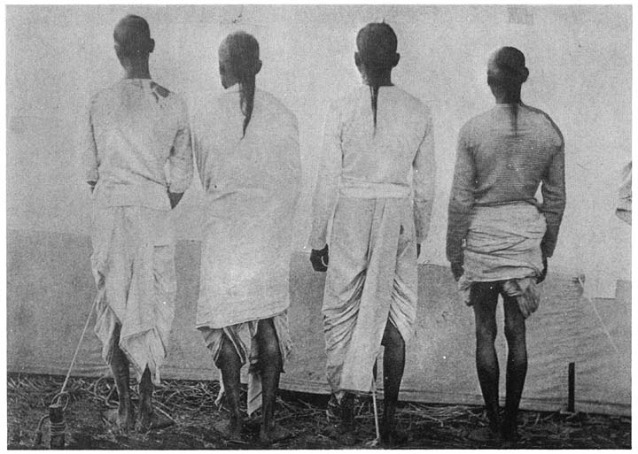Hindu men showing the choti or scalp-lock