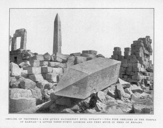 OBELISK OF THOTHMES I AND QUEEN HAPSHEPSET XVIII DYNASTY.  TWO FINE OBELISKS IN THE TEMPLE OF KARNAK--A LITTLE TOPSY-TURVY LOOKING AND VERY MUCH IN NEED OF REPAIRS