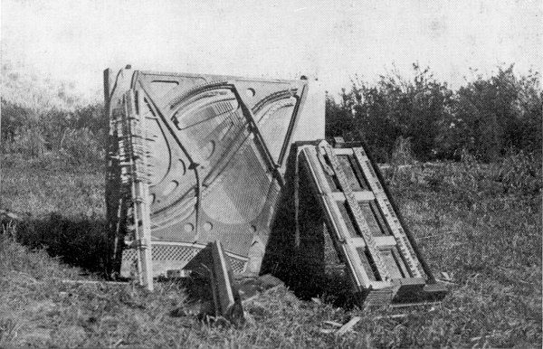 Grand piano picked up by a tornado and dropped in a cow-pasture.