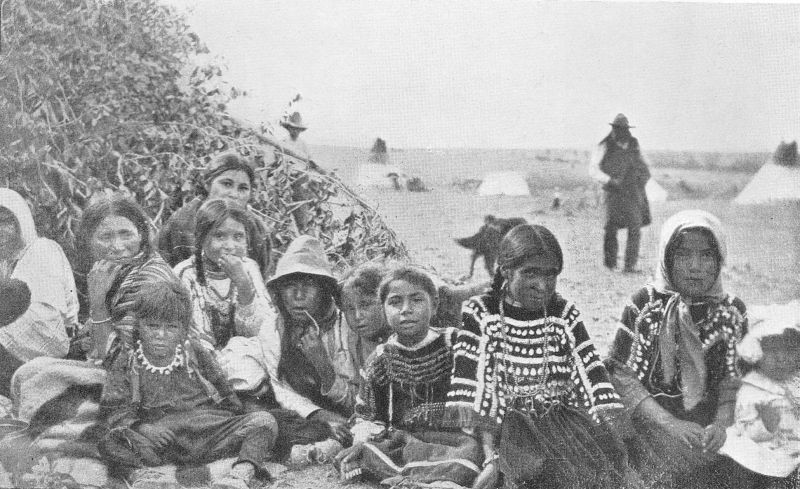 GROUP OF INDIAN CHILDREN ON PRAIRIE.