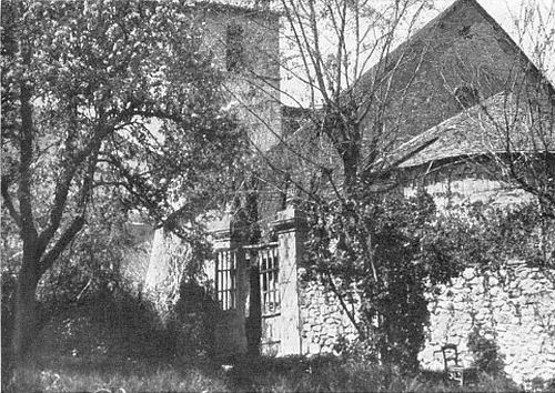 BETWEEN BRANCHES FULL OF APPLE-BLOSSOMS, THE CHURCH AS
THE CURÉ SAW IT