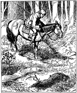 A man on a horse, looking down at a dead buck deer