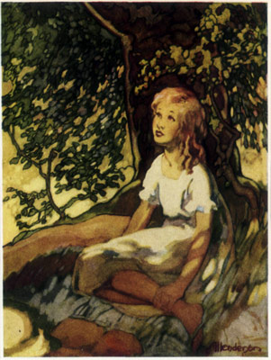 A young girl sitting beneath a tree