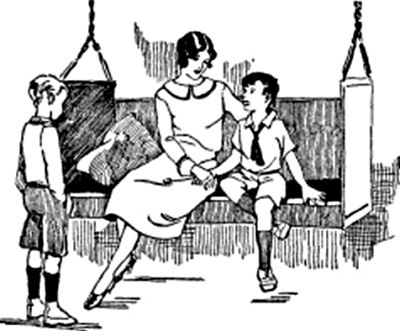 A mother and boy sit on a swing seat; another boy stands in front of them.