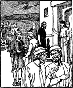 A number of men outside a building wait while two other men talk together.