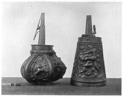 FIG. 94.—OLD POWDER FLASKS.

(In the Victoria and Albert Museum.)