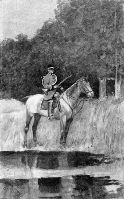 A hunter mounted on a horse.
