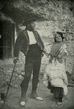 Frontispiece: "A little saint with
a color more lightful than orange"