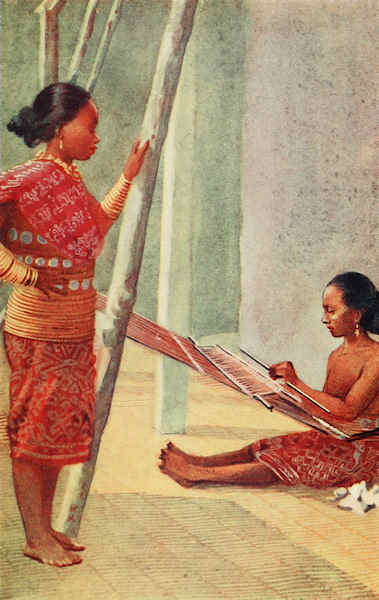 Two girls weaving