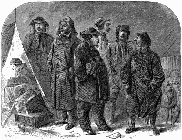 Seven men, looking bedraggled and downcast