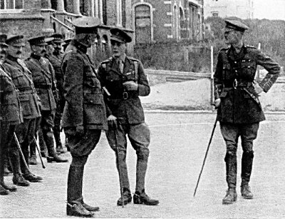 THE PRINCE OF WALES SPEAKING WITH BELGIAN OFFICERS AT LA PANNE,
BELGIUM