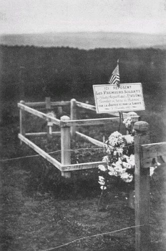 GRAVE OF FIRST AMERICAN KILLED IN FRANCE

Translation: Here Lie the First Soldiers of the Great Republic
of the United States of America, Fallen on French Soil for
Justice and for Liberty, November 3rd, 1917