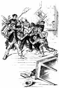 Eleven boys fighting, two of whom have chairs and another a broom up in the air ready to strike. One frightened boy is outside looking on through the window. Miss Loring is close by calling out to the boys, her hands up in the air by her head, as if unsure what to do. In the foreground a table lies on its side, and scattered on the floor are two hats and an opened book.