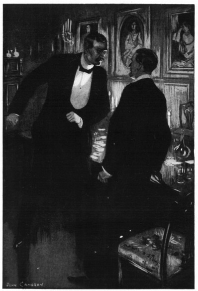 Two men, both dressed in evening clothes, are standing and facing each other.