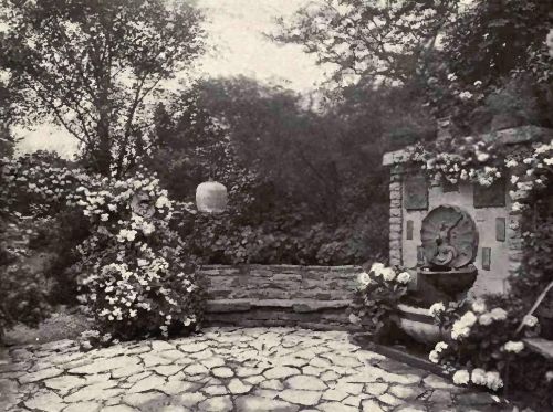 PLATE 131 A picturesque spot in Mrs. Taft's garden
