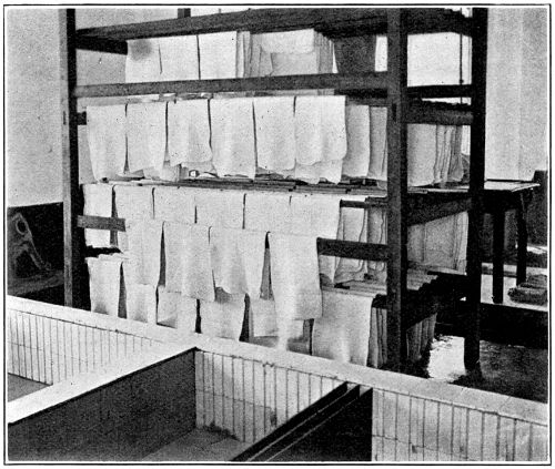 The Old Method
of 'Dripping' Freshly Rolled Sheets within the Factory