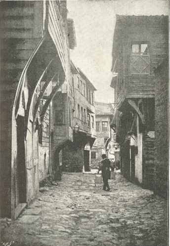 An old street, Constantinople.  (From a photograph by Fradelle
and Young)