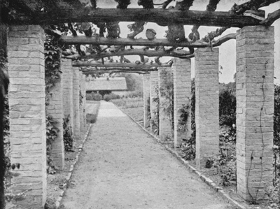 Pergola with Brick Piers and Beams of Rough Oak. (See opposite page 202.)
