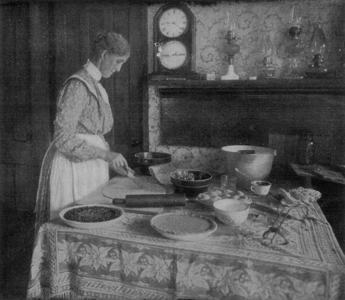 Old picture of an old lady baking an old pie
