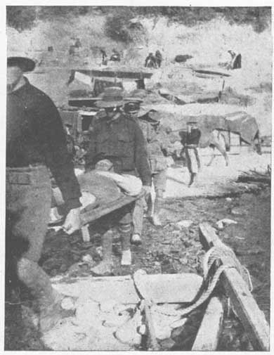 Stretcher Bearers carrying Col. Cox.