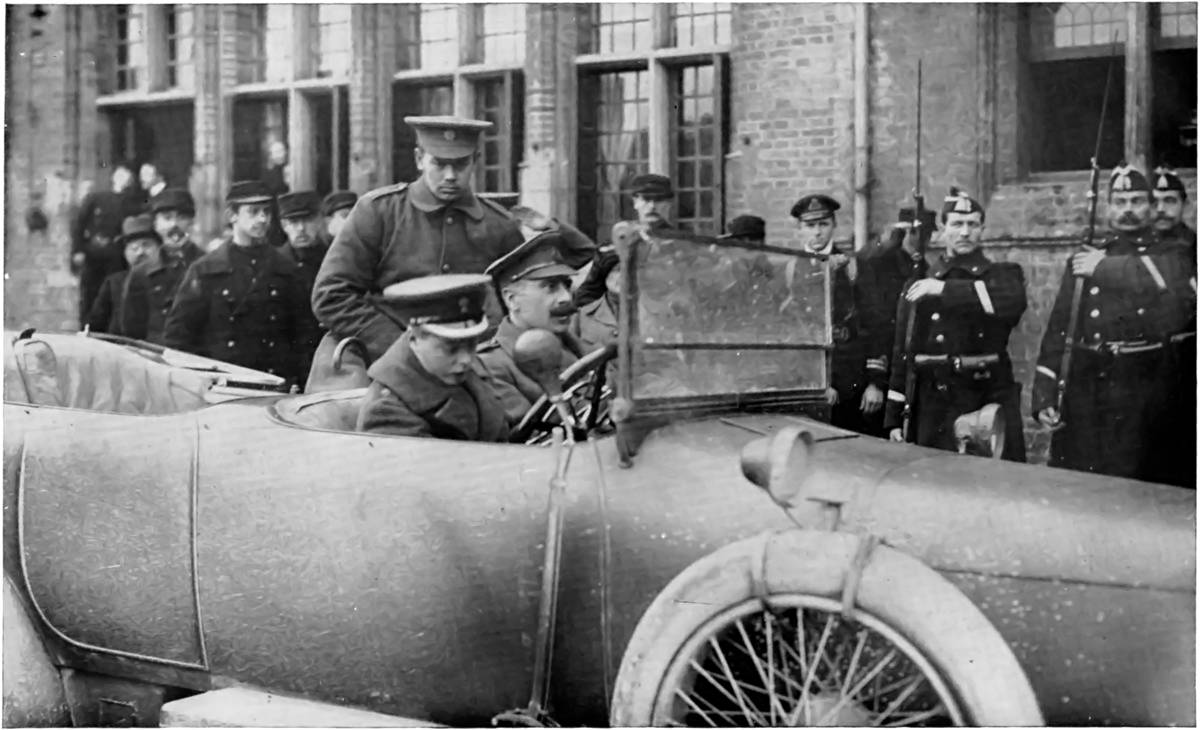 LIEUTENANT THE PRINCE OF WALES, AIDE-DE-CAMP TO SIR JOHN FRENCH, AT THE FRONT: H.R.H. DRIVING HIS OWN CAR, WITH PRINCE ALEXANDER OF TECK AS PASSENGER.