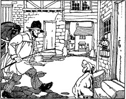 A man approaching a dog that is crouched by the door of a house.