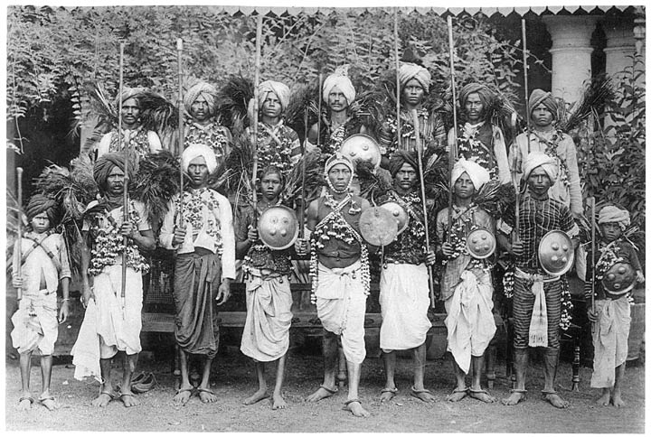 Ahīrs decorated with cowries for the Stick Dance at Diwāli.