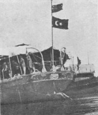 Guns And Boat Captured From The Turks