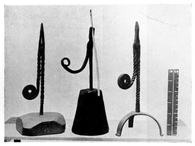 FIG. 14.—THREE RUSHLIGHT HOLDERS.

(In the National Museum of Wales, Cardiff.)