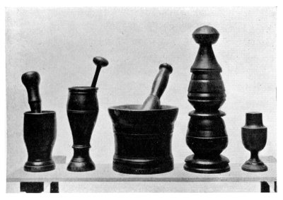 FIG. 50.—WOODEN COFFEE CRUSHERS AND PESTLES AND MORTAR.