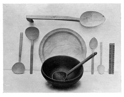 FIG. 53.—WOODEN PLATTER, BOWL, AND SPOONS.

(In the National Museum of Wales.)