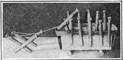 Fig. 16—The berry-basket wagon with clothespin horses.