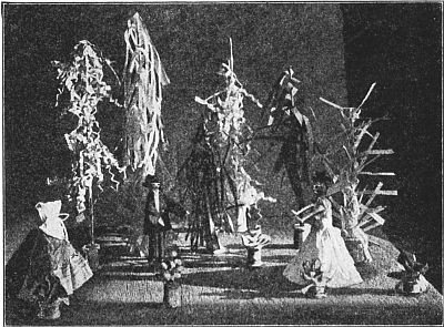 Fig. 63—Trees and flowers made of paper and spools.