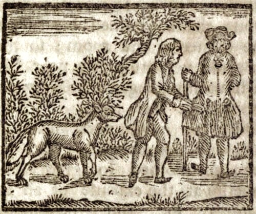Two men being followed by a wolf