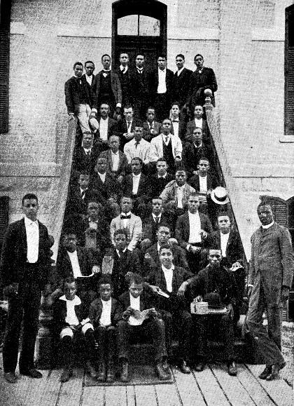 GROUP OF STUDENTS ON STEPS OF ALLEN HALL, TILLOTSON
COLLEGE.